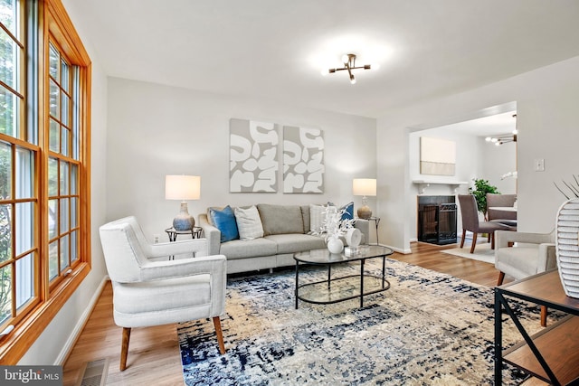 18165 Metz Dr, Germantown, MD 20874 - living area featuring baseboards and wood finished floors