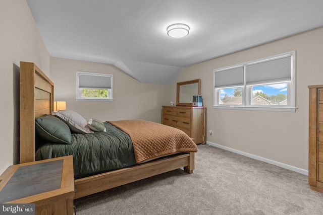 669 Worthington Dr, Warminster, PA 18974 - bedroom featuring light colored carpet, lofted ceiling, and baseboards