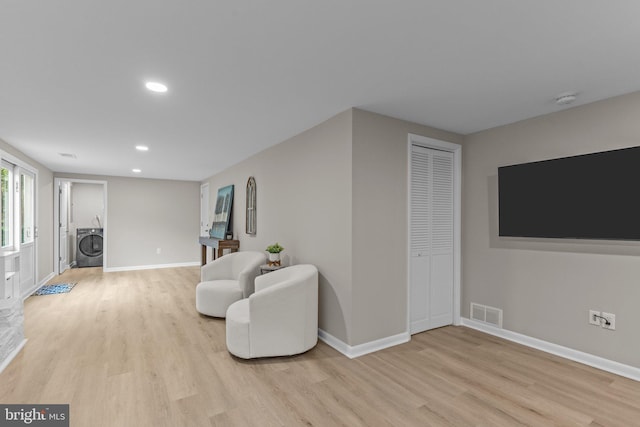 669 Worthington Dr, Warminster, PA 18974 - living area with washer / dryer, light wood-style flooring, recessed lighting, and baseboards