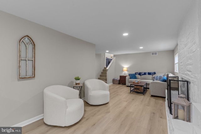 669 Worthington Dr, Warminster, PA 18974 - living area featuring stairs, light wood finished floors, recessed lighting, and baseboards