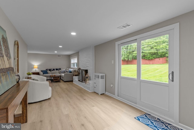 669 Worthington Dr, Warminster, PA 18974 - living room with light wood-type flooring, recessed lighting, a fireplace, and baseboards