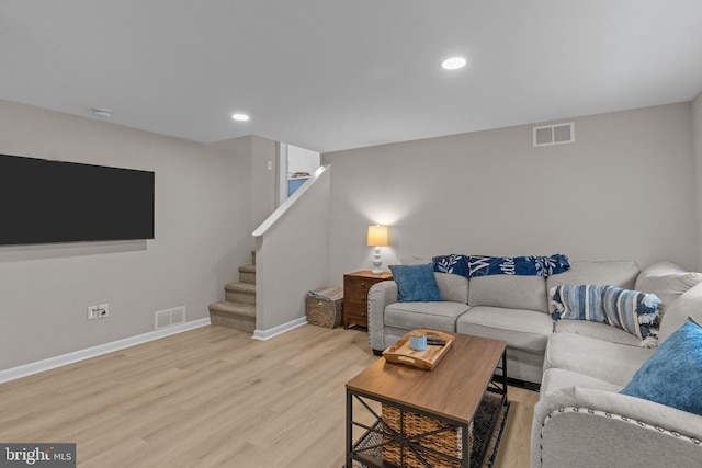 669 Worthington Dr, Warminster, PA 18974 - living room featuring light wood-type flooring, baseboards, stairs, and recessed lighting