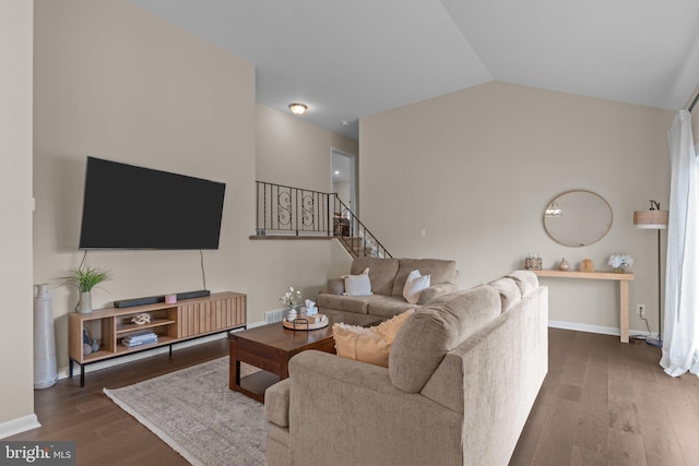669 Worthington Dr, Warminster, PA 18974 - living area featuring wood finished floors, stairway, baseboards, and lofted ceiling
