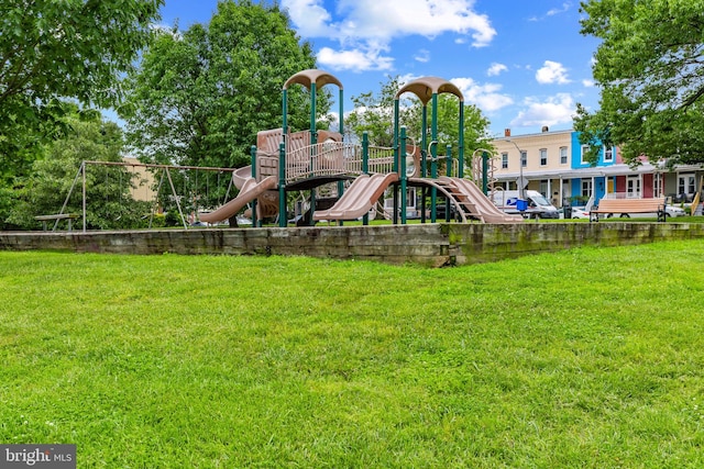 view of playground featuring a yard