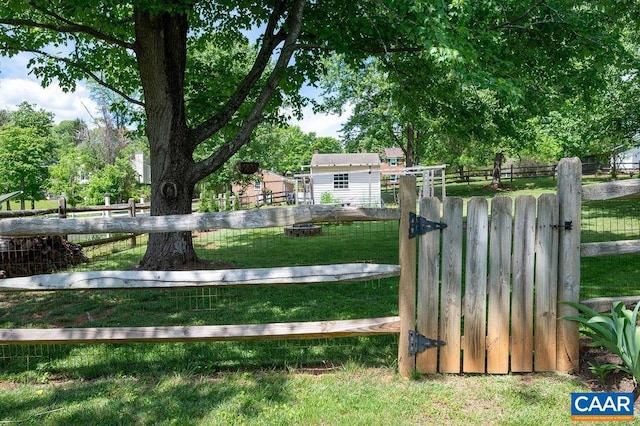 view of yard featuring a gate