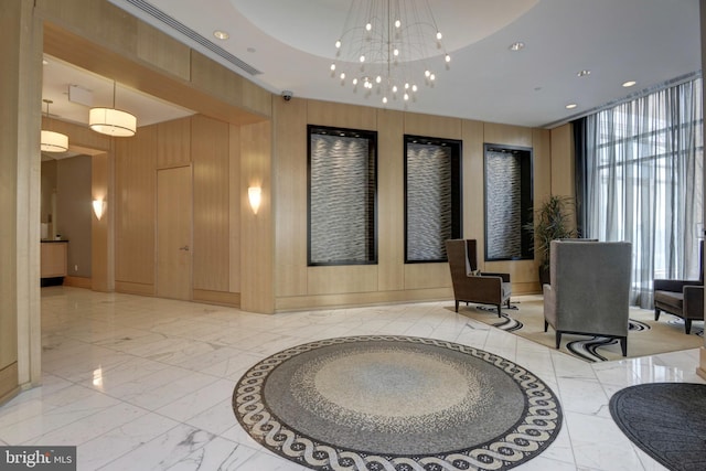 building lobby with a surveillance system, wooden walls, and recessed lighting