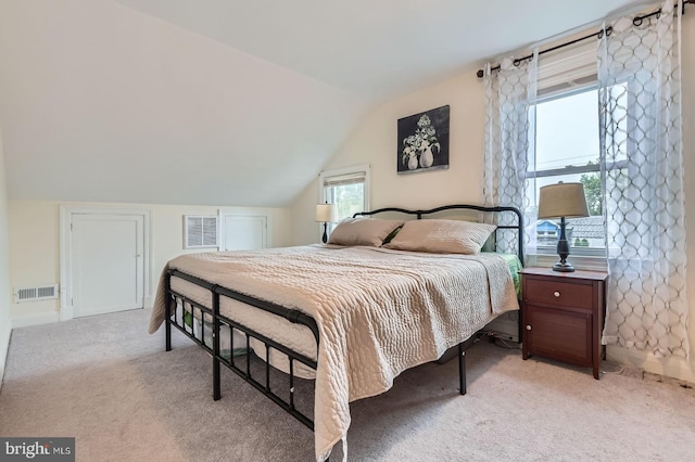 5622 Pilgrim Rd, Baltimore, MD 21214 - bedroom featuring lofted ceiling and light carpet