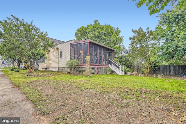 5622 Pilgrim Rd, Baltimore, MD 21214 - view of home's exterior with a sunroom and stairs