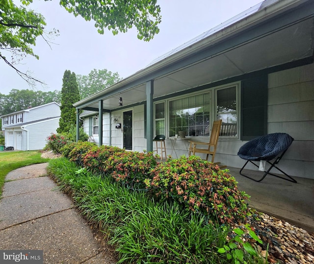 entrance to property with a porch