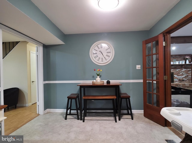 dining space with baseboards