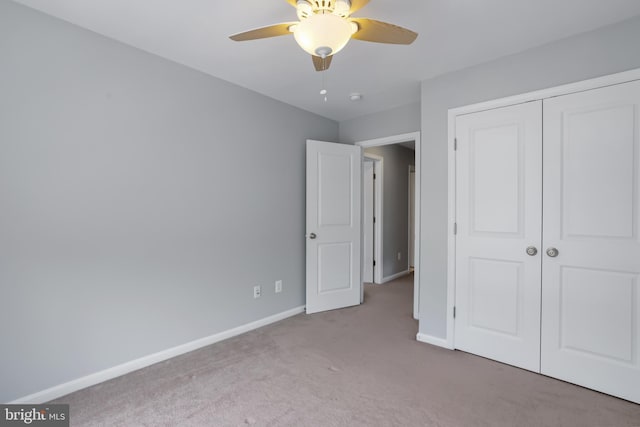 23462 Twin Falls Ter, Ashburn, VA 20148 - unfurnished bedroom featuring carpet flooring, baseboards, a closet, and a ceiling fan