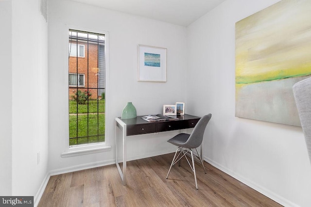 1214 Barnaby Ter SE, Washington, DC 20032 - office area with wood finished floors and baseboards