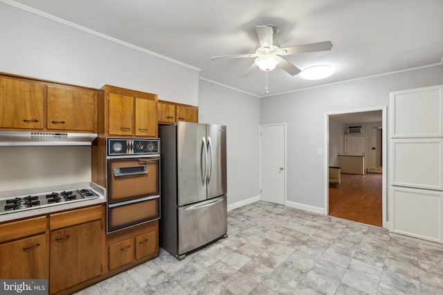 kitchen with stainless steel appliances, a warming drawer, under cabinet range hood, a ceiling fan, and brown cabinetry