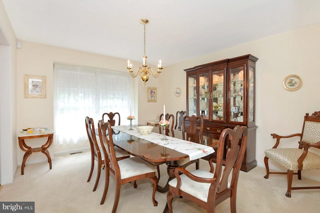 2 W Cartwright Dr, Princeton Junction, NJ 08550 - dining space featuring light colored carpet, a chandelier, and baseboards