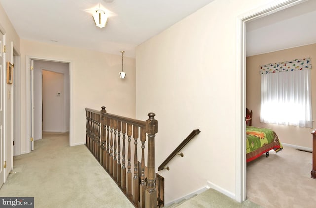 2 W Cartwright Dr, Princeton Junction, NJ 08550 - hall with an upstairs landing, carpet, and baseboards