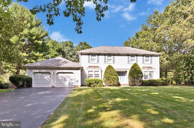2 W Cartwright Dr, Princeton Junction, NJ 08550 - colonial inspired home featuring a garage, driveway, and a front lawn