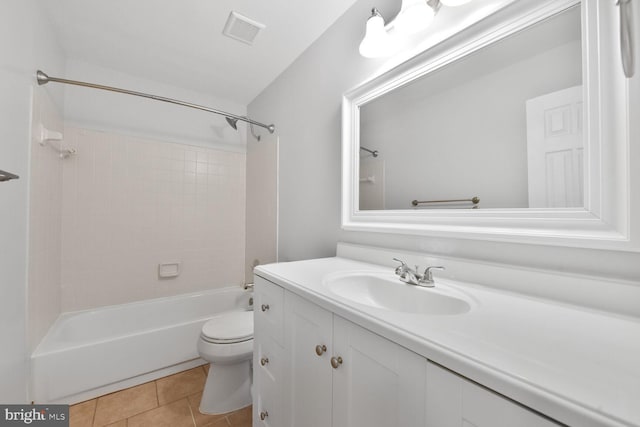 full bathroom with toilet, vanity, tile patterned flooring, and bathtub / shower combination