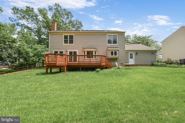 rear view of property with a chimney, a deck, and central air condition unit