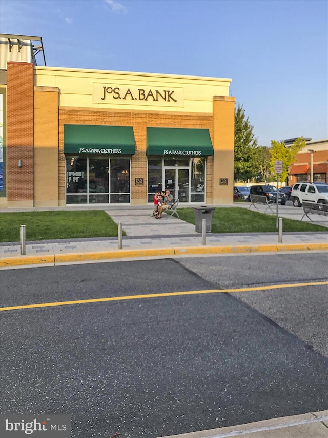 view of commercial location with uncovered parking