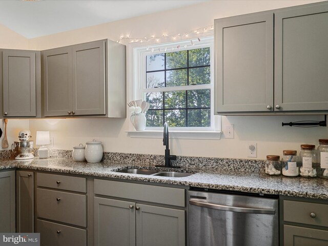 439 Windy Way, Front Royal, VA 22630 - kitchen featuring stainless steel dishwasher, gray cabinets, a sink, and light stone counters