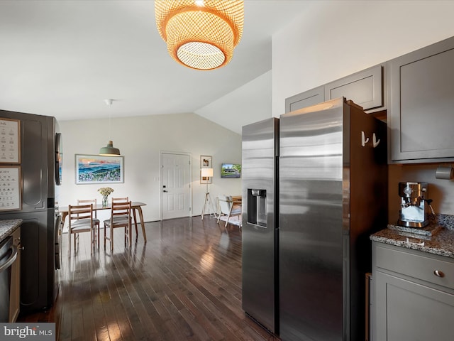 439 Windy Way, Front Royal, VA 22630 - kitchen featuring stainless steel fridge, gray cabinets, lofted ceiling, dark wood finished floors, and dark stone countertops