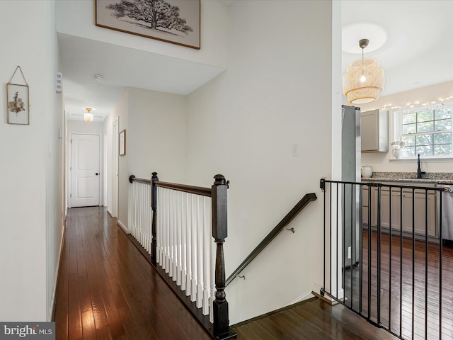 439 Windy Way, Front Royal, VA 22630 - hall with an upstairs landing, dark wood-type flooring, and a sink