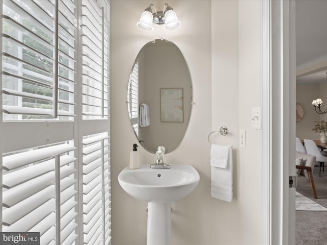1604 Hunting Creek Dr Unit B, Alexandria, VA 22314 - bathroom with a chandelier