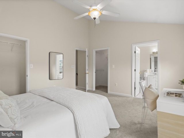 1604 Hunting Creek Dr Unit B, Alexandria, VA 22314 - carpeted bedroom featuring a spacious closet, a closet, high vaulted ceiling, baseboards, and ensuite bath