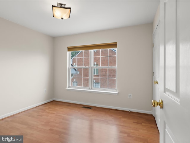 1604 Hunting Creek Dr Unit B, Alexandria, VA 22314 - unfurnished room featuring wood finished floors and baseboards