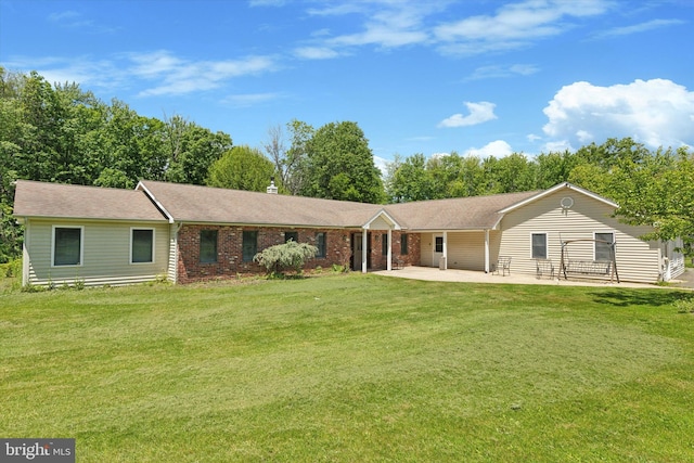 3789 Stump Rd, Doylestown, PA 18902 - ranch-style house featuring a front yard and a patio area
