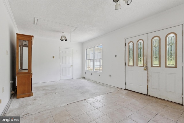3789 Stump Rd, Doylestown, PA 18902 - foyer featuring a textured ceiling and light tile patterned floors