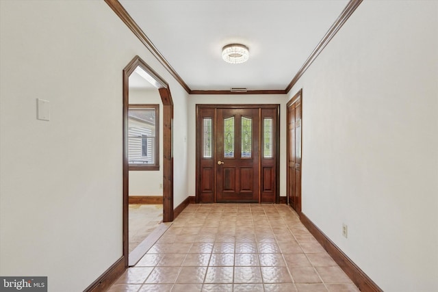 3789 Stump Rd, Doylestown, PA 18902 - entryway with ornamental molding, baseboards, and arched walkways