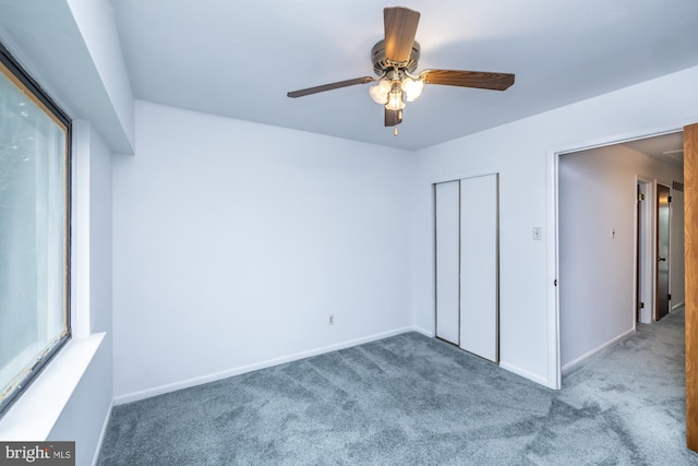 264 Summit House Unit 264, West Chester, PA 19382 - unfurnished bedroom with carpet flooring, a closet, baseboards, and multiple windows