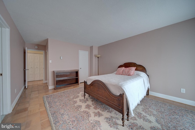 6100 Westchester Park Dr Unit 804, College Park, MD 20740 - bedroom featuring baseboards