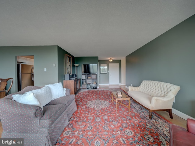 6100 Westchester Park Dr Unit 804, College Park, MD 20740 - living area with baseboards