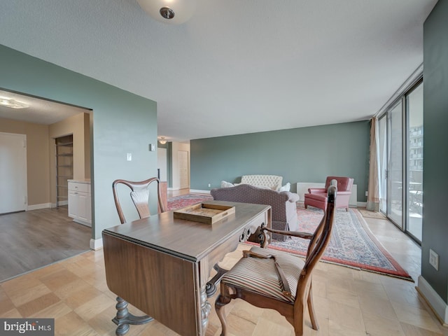 6100 Westchester Park Dr Unit 804, College Park, MD 20740 - home office featuring baseboards and light floors
