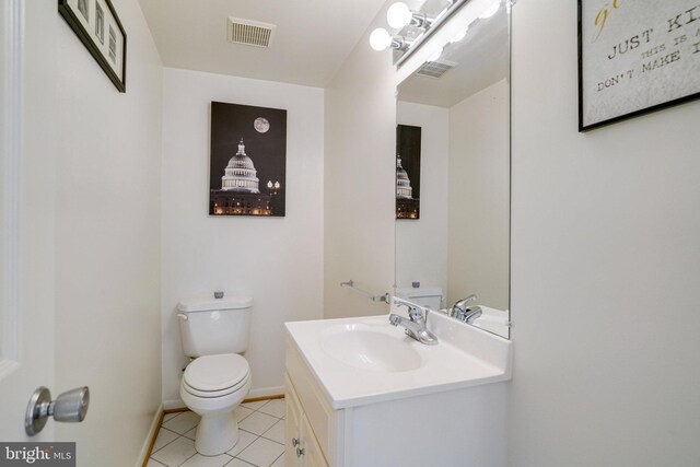5101 Ampthill Dr, Alexandria, VA 22312 - half bath featuring toilet, tile patterned floors, baseboards, and vanity