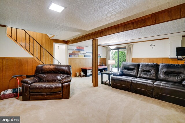 5101 Ampthill Dr, Alexandria, VA 22312 - carpeted living area with wood walls, stairway, a wainscoted wall, and an ornate ceiling