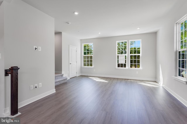 14 Chesapeake Ln Unit C, La Plata, MD 20646 - unfurnished room featuring healthy amount of natural light, stairs, dark wood-style flooring, and recessed lighting