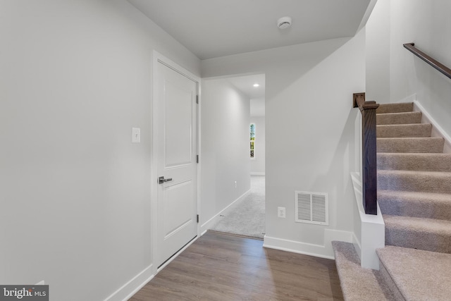 14 Chesapeake Ln Unit C, La Plata, MD 20646 - staircase with baseboards, wood finished floors, and recessed lighting