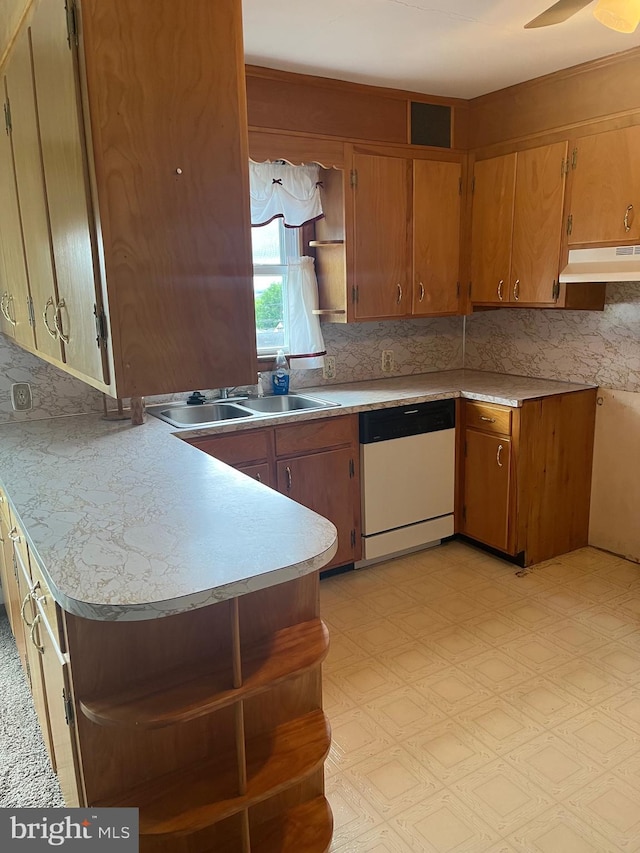 313 Northfield Ave, Waynesboro, PA 17268 - kitchen featuring dishwasher, open shelves, under cabinet range hood, light countertops, and backsplash