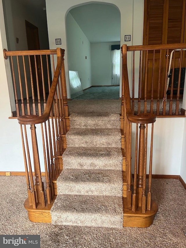 313 Northfield Ave, Waynesboro, PA 17268 - stairs featuring carpet, arched walkways, and baseboards