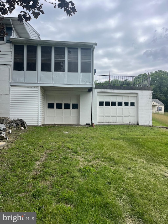 313 Northfield Ave, Waynesboro, PA 17268 - back of property with a yard and an attached garage