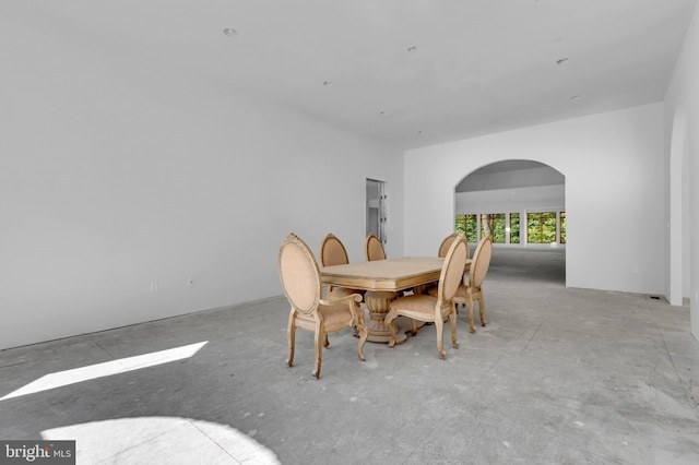 6 Evan Way, Pikesville, MD 21208 - dining space featuring arched walkways and concrete flooring