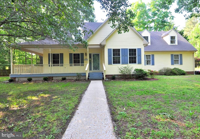 view of front facade featuring a front lawn, a porch, crawl space, and roof with shingles