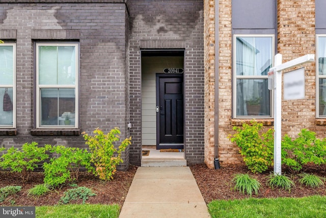 20941 Bluebird Sq, Sterling, VA 20165 - doorway to property featuring brick siding