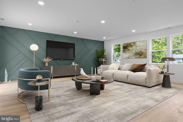 2564 Forrest Ave, Bensalem, PA 19020 - living area featuring a decorative wall, an accent wall, plenty of natural light, wood finished floors, and recessed lighting