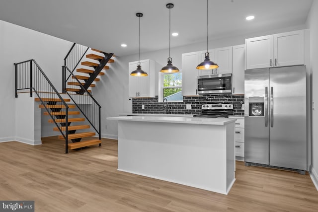 2564 Forrest Ave, Bensalem, PA 19020 - kitchen with appliances with stainless steel finishes, baseboards, backsplash, light wood finished floors, and recessed lighting