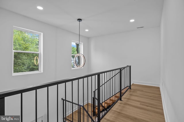 2564 Forrest Ave, Bensalem, PA 19020 - hall with an upstairs landing, recessed lighting, wood finished floors, and baseboards