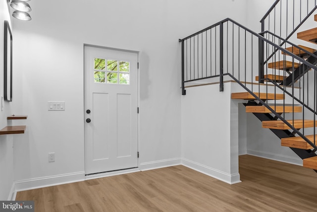 2564 Forrest Ave, Bensalem, PA 19020 - foyer entrance featuring wood finished floors, baseboards, and stairway